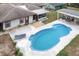 Birds eye view of a private pool, patio, and fenced in yard at 800 Jefferis Ct, Eustis, FL 32726