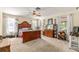 Spacious bedroom featuring windows, carpet, and classic furnishings at 800 Jefferis Ct, Eustis, FL 32726