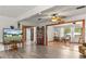 Bright living room with a cozy atmosphere and hardwood floors throughout at 800 Jefferis Ct, Eustis, FL 32726