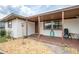 Inviting covered porch with tile flooring and comfortable seating, perfect for relaxing outdoors at 800 Jefferis Ct, Eustis, FL 32726