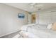 Cozy bedroom with a large bed, overhead fan, and closet at 802 San Salvador Dr, The Villages, FL 32159