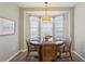 Cozy breakfast nook with bay window and casual dining table at 802 San Salvador Dr, The Villages, FL 32159