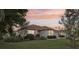 Attractive single-story home featuring lush landscaping, well-maintained lawn, and a neutral color scheme at 802 San Salvador Dr, The Villages, FL 32159