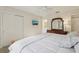 Comfortable main bedroom features plenty of closet space and natural light at 802 San Salvador Dr, The Villages, FL 32159