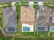 An aerial view showcases the home's backyard oasis with a pool and tile roof, surrounded by lush landscaping and neighboring properties at 8530 Vivaro Isle Way, Windermere, FL 34786