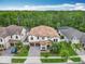 Gorgeous home with meticulously landscaped yard and paver driveway, aerial view at 8530 Vivaro Isle Way, Windermere, FL 34786