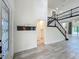 Spacious foyer with staircase and decorative lighting, offers ample space at 8530 Vivaro Isle Way, Windermere, FL 34786