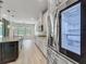 Well-equipped kitchen features stainless steel appliances and designer backsplash at 8530 Vivaro Isle Way, Windermere, FL 34786