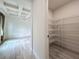 Convenient walk-in pantry with ample shelving and easy access to the kitchen and dining area at 8530 Vivaro Isle Way, Windermere, FL 34786