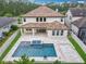 Stunning home with a private pool, covered patio, and a beautifully tiled roof, perfect for outdoor living and entertaining at 8530 Vivaro Isle Way, Windermere, FL 34786