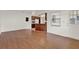 Open living area with views into the kitchen at 8709 Sw 96Th St # A, Ocala, FL 34481