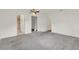 Spacious carpeted main bedroom features a walk-in closet and an ensuite bathroom at 8709 Sw 96Th St # A, Ocala, FL 34481
