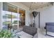 View from the lanai into the house shows an outdoor kitchen and a sliding glass door to the living space at 8978 Se 42Nd Ct, Ocala, FL 34480
