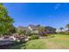Expansive backyard with outdoor seating area, screened-in patio, and well-manicured lawn at 9648 Weatherstone, Windermere, FL 34786