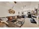 Spacious bonus room with leather sectional, unique wall art, and entertainment center with a drum set at 9648 Weatherstone, Windermere, FL 34786