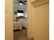 Bedroom with two beds, ceiling fan, and view of hallway at 10115 Regent Park Dr # 2503, Orlando, FL 32825