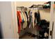 Walk-in closet featuring clothing racks, shelves, and overhead storage at 10115 Regent Park Dr # 2503, Orlando, FL 32825