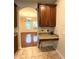 This well-organized kitchen offers ample storage and counter space, perfect for meal preparation and staying tidy at 108 Whispering Pines Way, Davenport, FL 33837