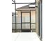 Screened-in pool area with an outdoor shower to rinse off after a swim at 108 Whispering Pines Way, Davenport, FL 33837