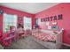 Bright pink bedroom featuring a playful decor, large windows, and lots of natural light at 1155 Dora Parc Ln, Mount Dora, FL 32757