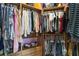 Spacious walk-in closet with custom shelving and plenty of hanging space for clothes and accessories at 1155 Dora Parc Ln, Mount Dora, FL 32757