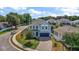 Beautiful curb appeal with lush landscaping on a sunny day showcases this lovely home at 1155 Dora Parc Ln, Mount Dora, FL 32757