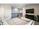 Relaxing loft with comfortable seating area, neutral tones, and access to additional rooms at 1155 Dora Parc Ln, Mount Dora, FL 32757