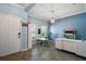 Versatile room with natural light, neutral paint, and wood-look tile flooring at 1155 Dora Parc Ln, Mount Dora, FL 32757
