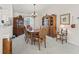Traditional dining room with a chandelier and a wooden dining set at 12118 Se 175Th Loop, Summerfield, FL 34491