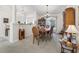 Dining room featuring a chandelier and a display cabinet at 12118 Se 175Th Loop, Summerfield, FL 34491