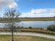 Scenic lake view from the property showcasing the tranquil water and surrounding landscape at 1342 Royal Saint George Blvd, Davenport, FL 33896