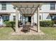 Back patio seating area perfect for outdoor relaxation at 1342 Royal Saint George Blvd, Davenport, FL 33896