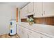 A utility room with ample storage and countertop space at 1416 Abigail Dr, Apopka, FL 32703