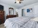 Spacious bedroom with wood floors, ceiling fan, and plenty of space for furniture at 1722 Moreno Pl, The Villages, FL 32159
