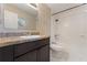 Bathroom showcasing a vanity, mirror, toilet, and tub with a shower head at 1725 14Th St, Orange City, FL 32763