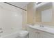 Bright bathroom with a white vanity, toilet, and a tub/shower combination with white tiling at 1725 14Th St, Orange City, FL 32763