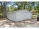 Metal outbuilding or shed with dual doors, perfect for storage or a workshop at 1725 14Th St, Orange City, FL 32763