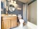 Bathroom featuring a vanity with storage and a combined shower and tub, optimizing space at 1930 Farmington Ct, Clermont, FL 34711