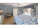 Airy bedroom with views of the pool and sliding glass doors, offering seamless indoor-outdoor living at 1930 Farmington Ct, Clermont, FL 34711