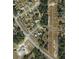 Aerial view of neighborhood, showing lot lines, surrounding homes, and nearby streets at 2 Pine Terrace Way, Ocala, FL 34472