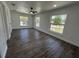 Bright bedroom features wood-look floors and large windows offering plenty of natural light at 2 Pine Terrace Way, Ocala, FL 34472