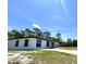Exterior elevation of single-story home with a blue sky background at 2 Pine Terrace Way, Ocala, FL 34472