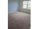 Cozy bedroom with plush carpeting, providing a comfortable and inviting space at 2106 Elio Ridge Dr, Zellwood, FL 32798