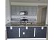 Spacious kitchen with granite countertops, a large island and modern stainless steel appliances at 2106 Elio Ridge Dr, Zellwood, FL 32798