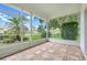 The screened lanai provides a tranquil space to enjoy outdoor views at 21226 Royal St Georges Ln, Leesburg, FL 34748