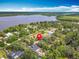 Beautiful aerial view of a residential area near a lake, marked with a location pin at 2216 River Ridge Rd, Deland, FL 32720