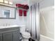 Bathroom featuring a shower, toilet, and vanity with towels at 2216 River Ridge Rd, Deland, FL 32720