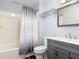 Bathroom featuring a shower with new curtain, toilet, and new vanity at 2216 River Ridge Rd, Deland, FL 32720