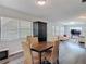 Bright dining room with view into living room at 2216 River Ridge Rd, Deland, FL 32720