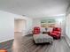 Comfortable living room showcasing elegant seating arrangements and hardwood floors, perfect for relaxation at 2216 River Ridge Rd, Deland, FL 32720